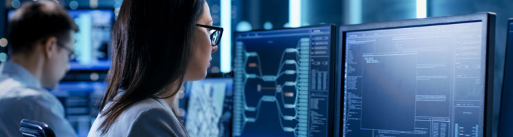 woman in front of monitor