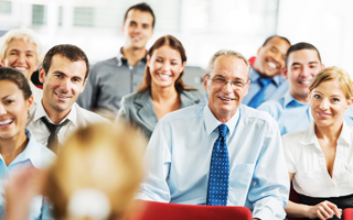Cheerful Businesspeople on a Seminar