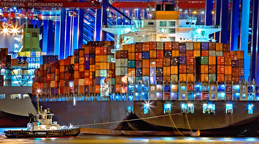cargo boat and colorful containers with lights